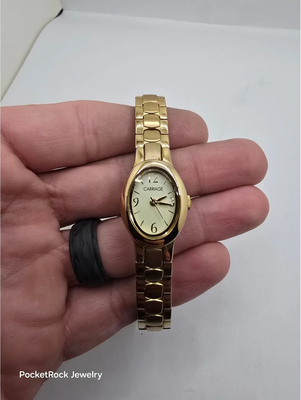 Carriage by Timex Women’s Quartz Analog Oval Gold Tone White Dial Metal Stretch
